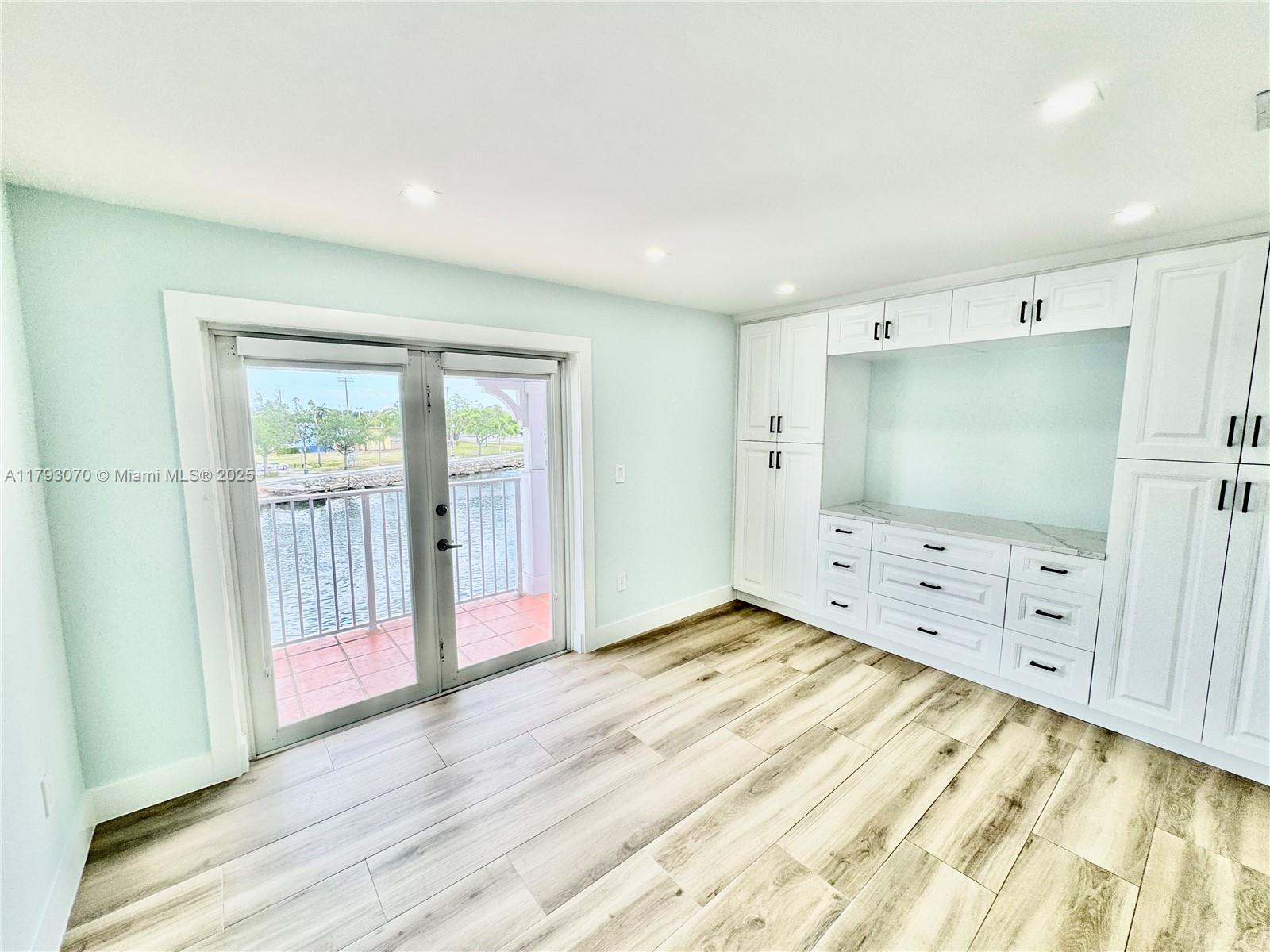 2415 Northwest 16th St Road, Unit 101 Miami, FL 33125 - Photo 20 of 36 a view of an empty room