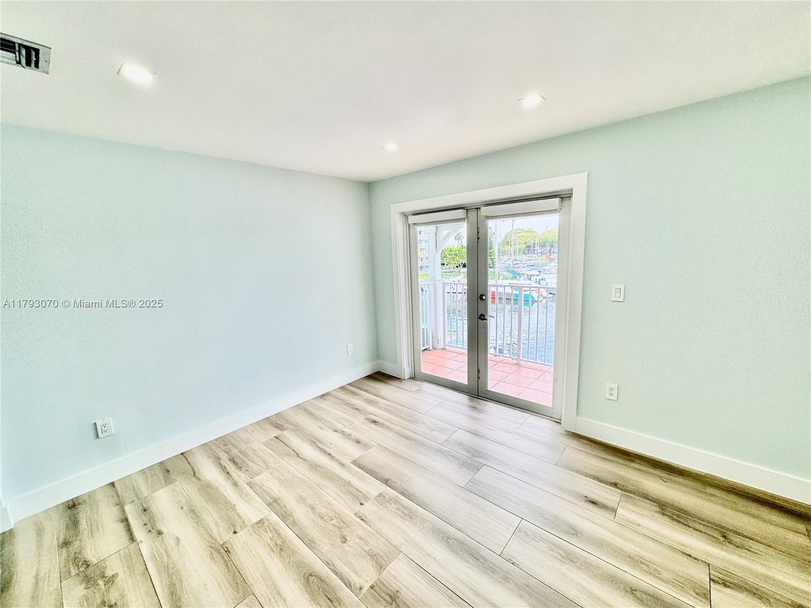 2415 Northwest 16th St Road, Unit 101 Miami, FL 33125 - Photo 23 of 36 a view of an empty room