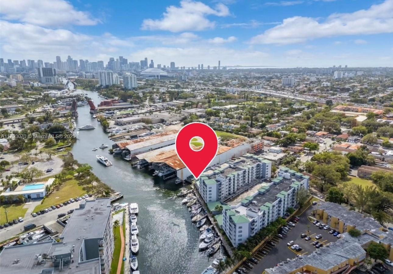 2415 Northwest 16th St Road, Unit 101 Miami, FL 33125 - Photo 9 of 36 a view of a outdoor space