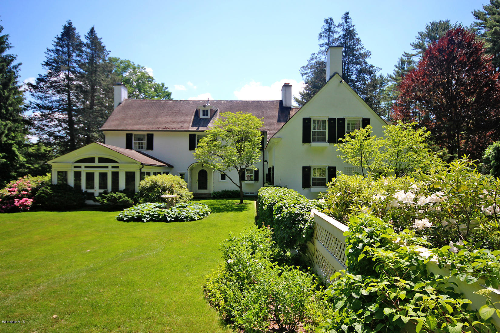 6 Glendale Road Stockbridge, MA 01229 - Photo 16 of 45 a front view of a house with a yard
