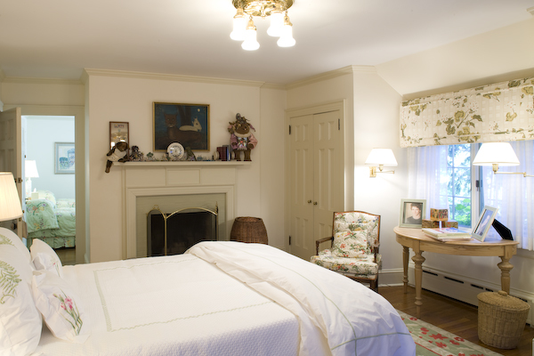 6 Glendale Road Stockbridge, MA 01229 - Photo 37 of 45 a bedroom with a bed and a chandelier