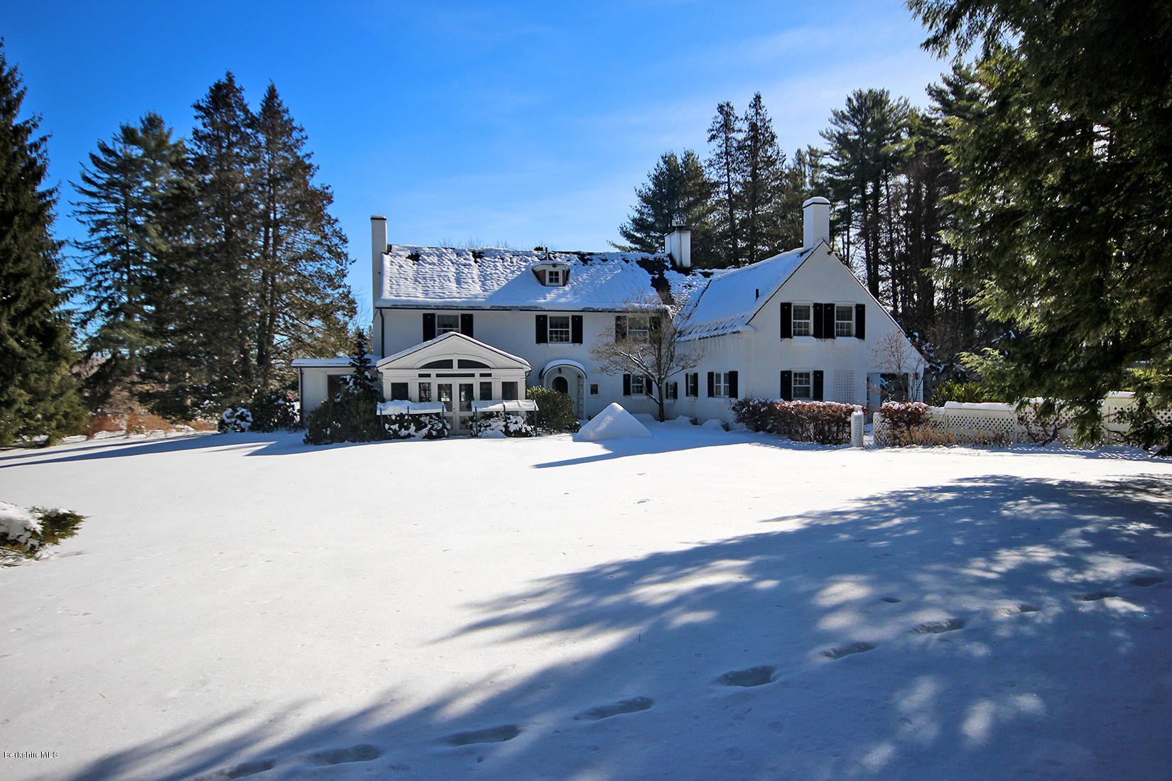 6 Glendale Road Stockbridge, MA 01229 - Photo 44 of 45 a view of a house with snow on the road