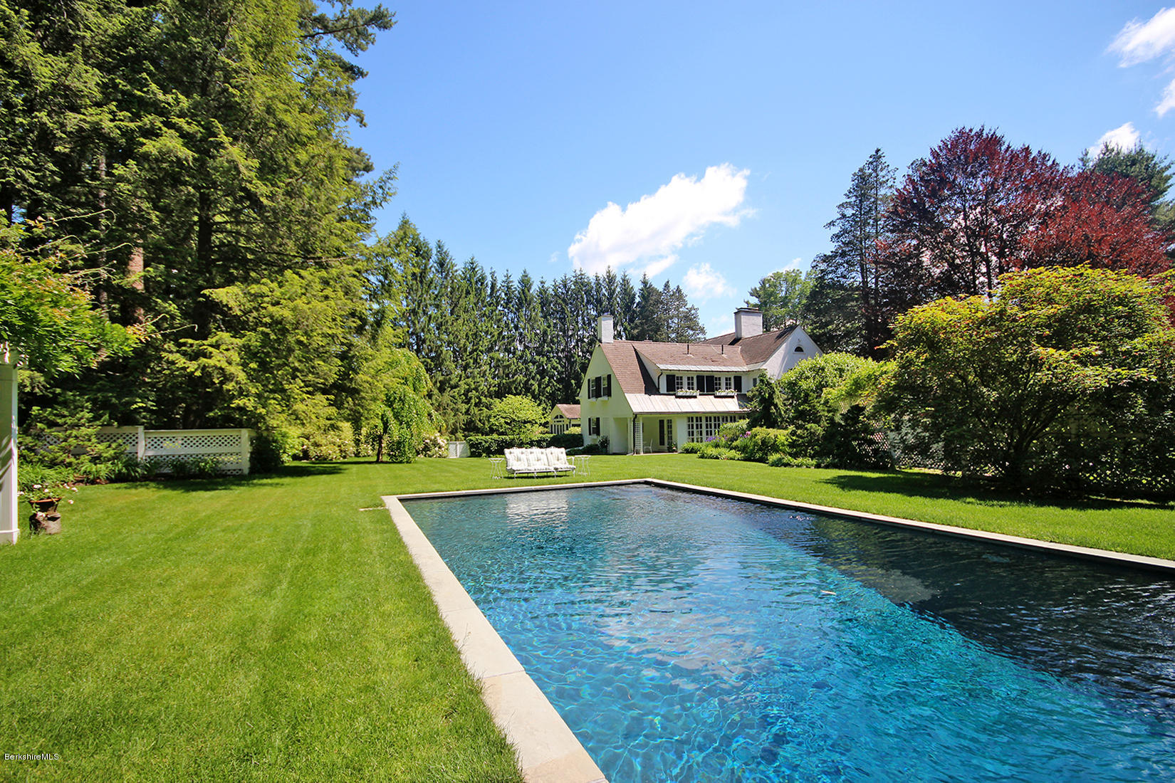 6 Glendale Road Stockbridge, MA 01229 - Photo 10 of 45 a view of a swimming pool with a yard