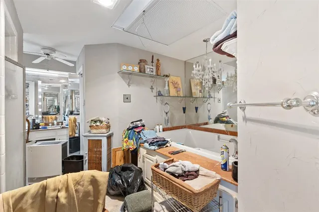 a view of a livingroom with furniture and gym equipment