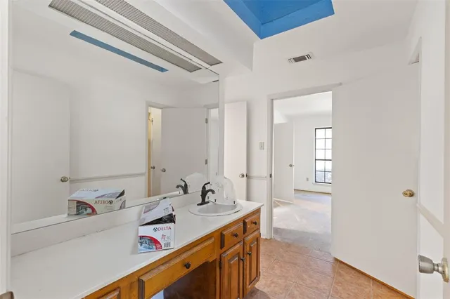 a bathroom with a sink a toilet and a bathtub