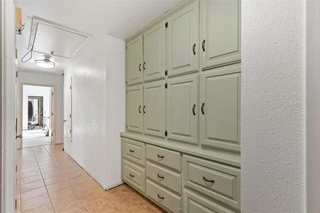 a bathroom with a sink and a window