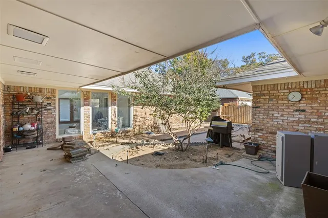 a house with a swimming pool in front of it
