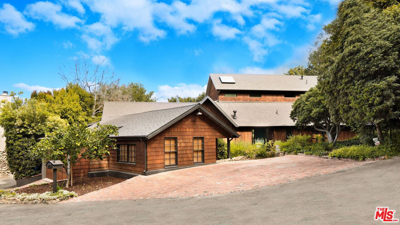 42 Haldeman Road Santa Monica, CA 90402 - Photo 1 of 1 a front view of a house with a yard and garage