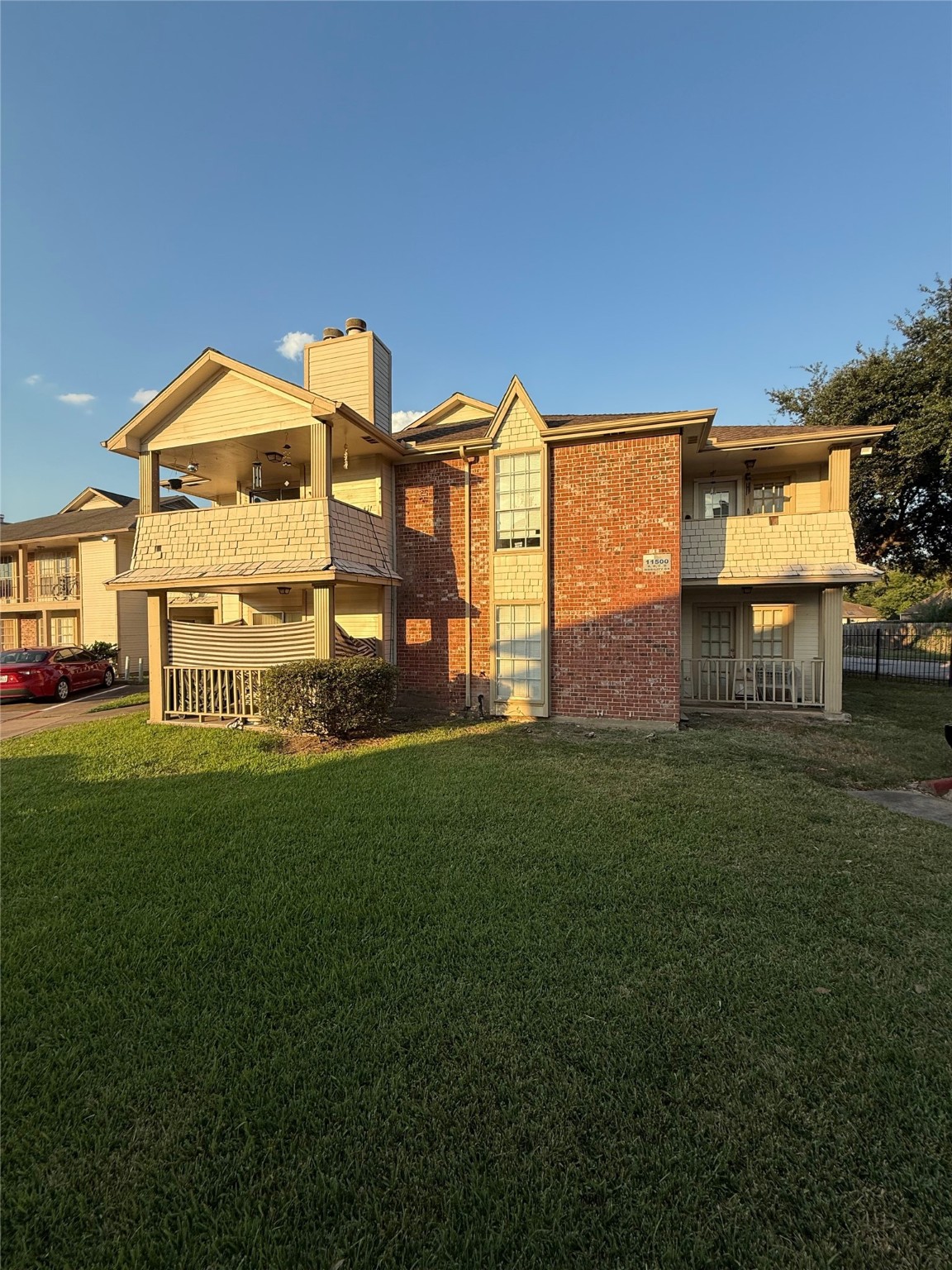 11500 Meadow Lane, Unit 4 Houston, TX 77477 - Photo 1 of 13 a view of a house with a backyard
