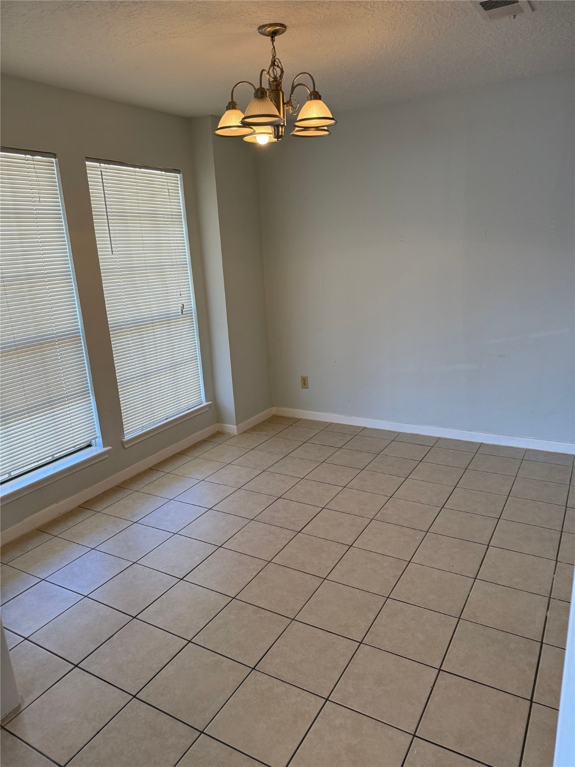 11500 Meadow Lane, Unit 4 Houston, TX 77477 - Photo 9 of 13 a view of an empty room with a window