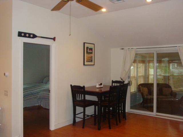 49 Lawrence Road Dennis Port, MA 02639 - Photo 11 of 14 a view of a dining room with furniture and window