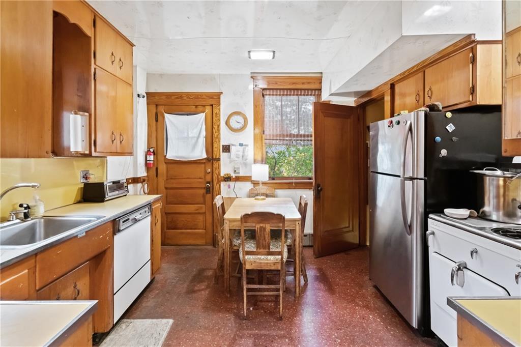 155 Hinkel Road Pittsburgh, PA 15229 - Photo 12 of 40 The large eat-in kitchen explodes with 1950s style!