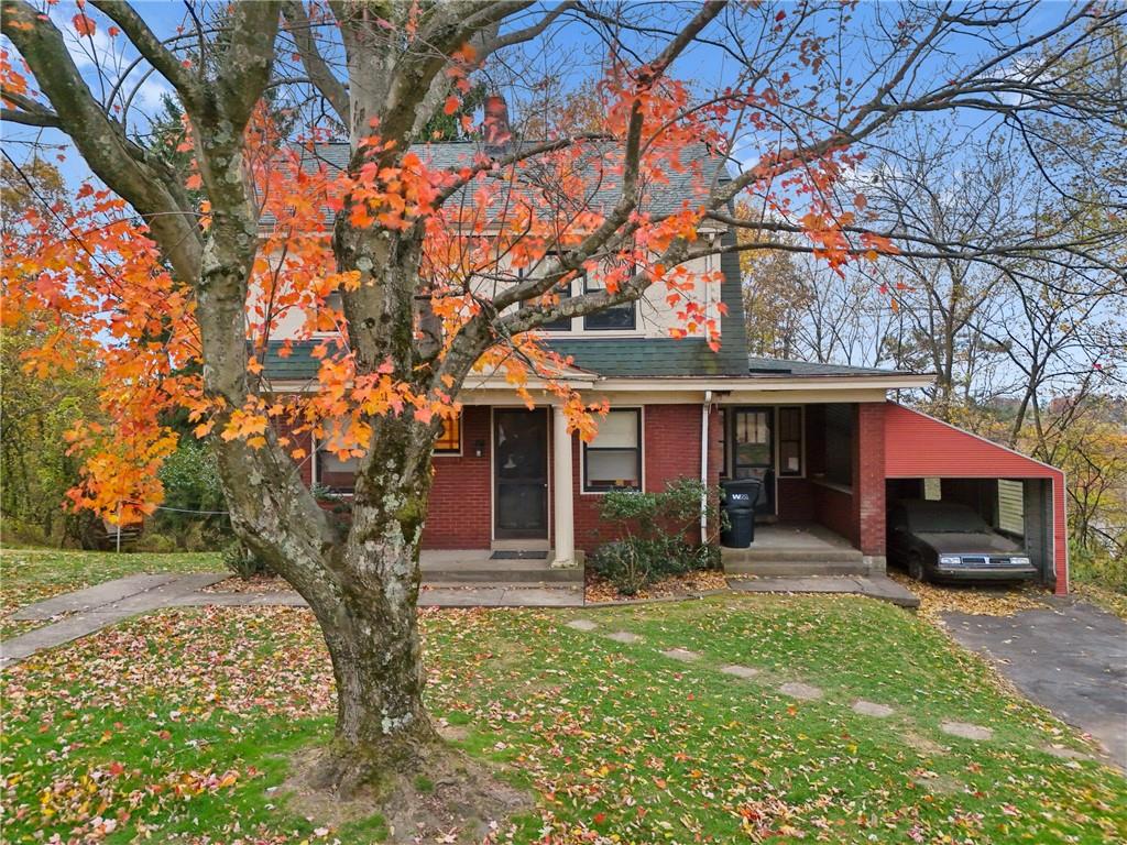 155 Hinkel Road Pittsburgh, PA 15229 - Photo 28 of 40 The red brick facade, classic columns, covered porch, and autumn-kissed trees give this 1920s gem the timeless grandeur of a bygone era.