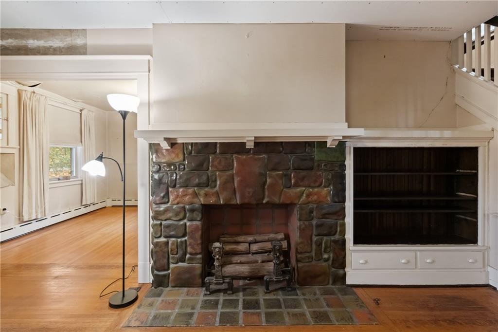 155 Hinkel Road Pittsburgh, PA 15229 - Photo 4 of 40 Gas fireplace and built-in bookcases add to the charm of this historic home!