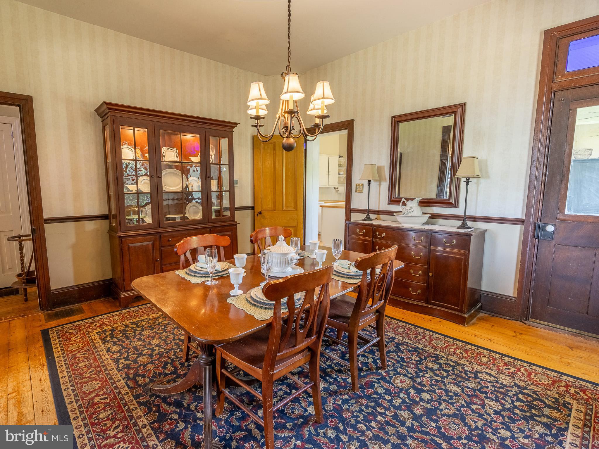 225 Niantic Road Barto, PA 19504 - Photo 27 of 82 a dining room with furniture a chandelier and wooden floor