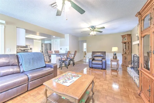 a living room with a couch and a flat screen tv