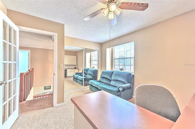 a bedroom with bed and window