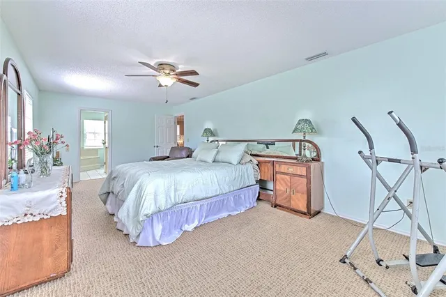 a bath room with a toilet and a bath tub