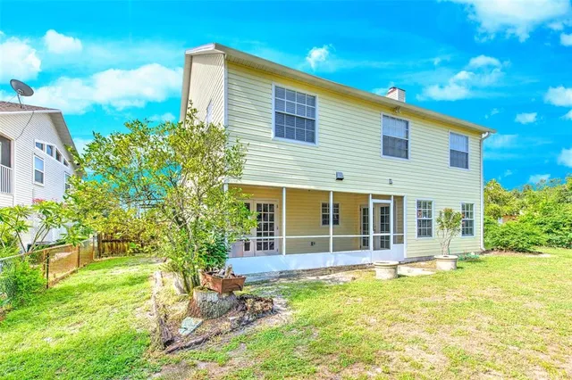 a view of a field with an trees
