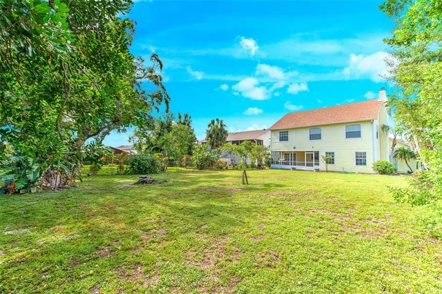 a view of a building with a big yard