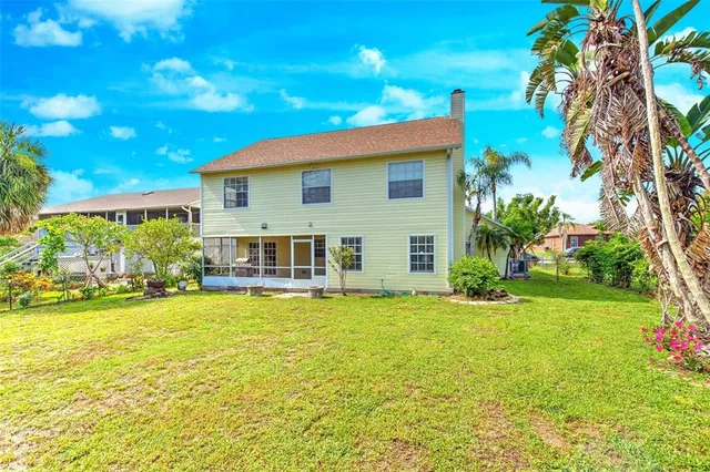 a building with trees in the background
