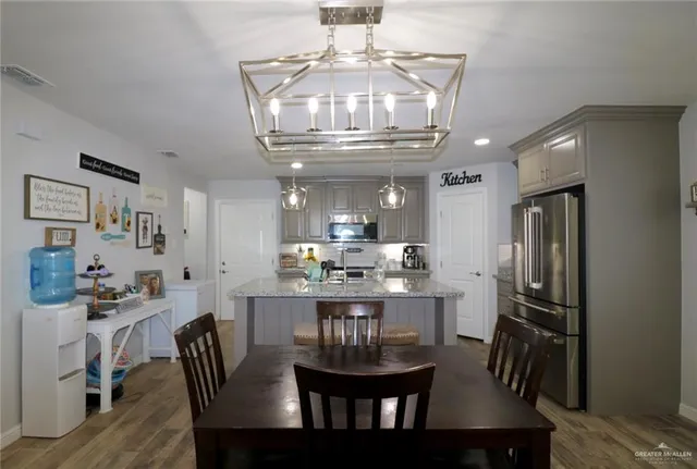 a view of a dining room with furniture
