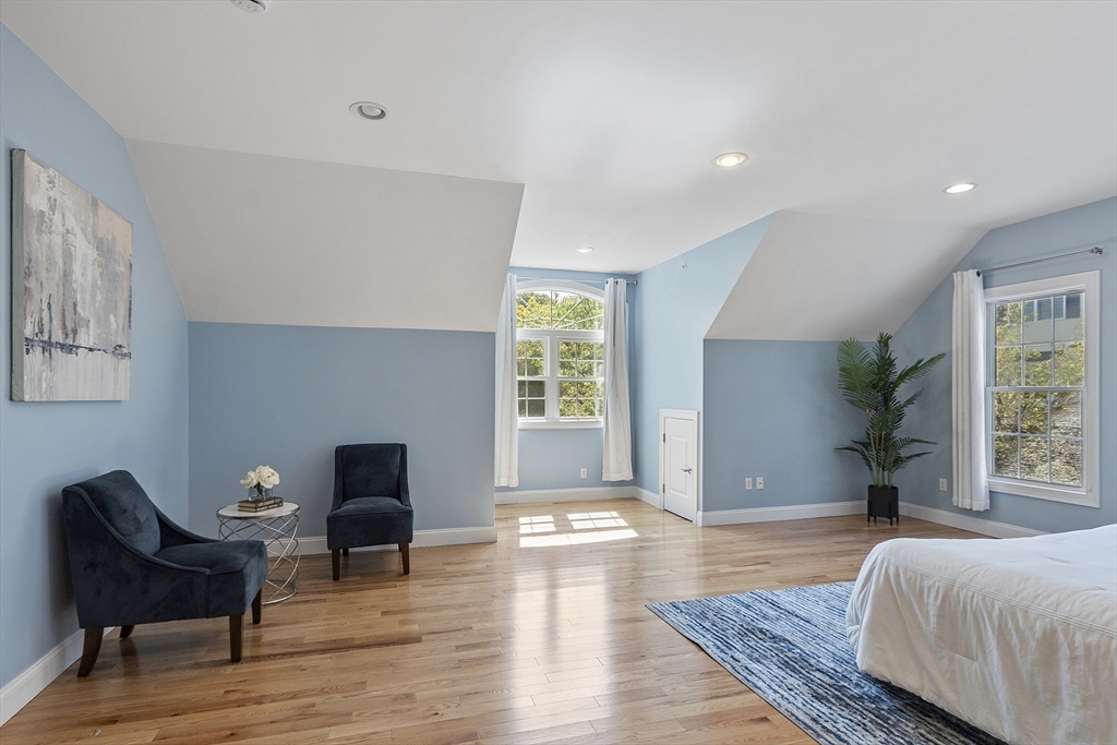 139 Prospect Street, Unit 5 Acton, MA 01720 - Photo 16 of 34 a living room with furniture rug and window