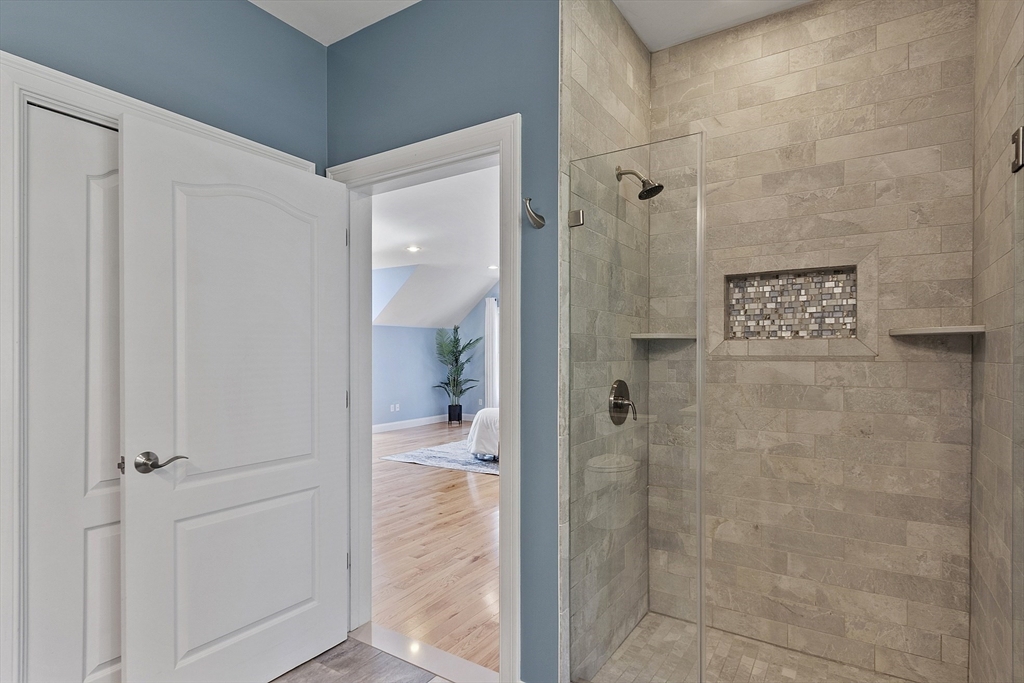 139 Prospect Street, Unit 5 Acton, MA 01720 - Photo 20 of 34 a bathroom with a shower and a sink