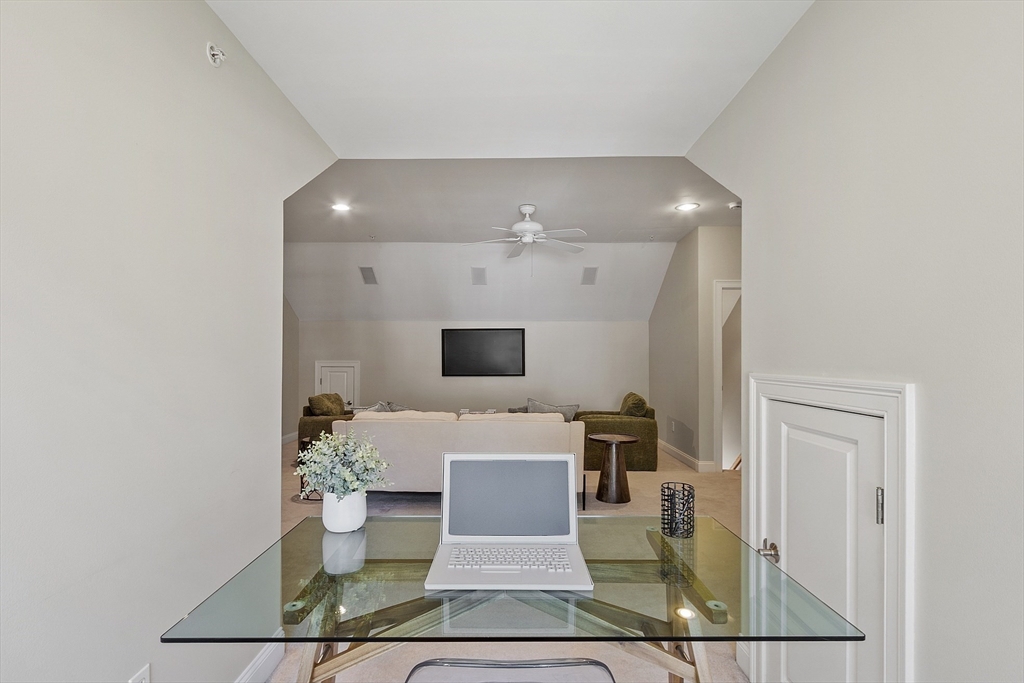 139 Prospect Street, Unit 5 Acton, MA 01720 - Photo 26 of 34 a living room with furniture and a wooden floor