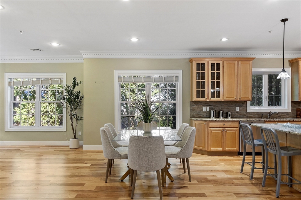 139 Prospect Street, Unit 5 Acton, MA 01720 - Photo 7 of 34 a view of a dining room with furniture window and wooden floor