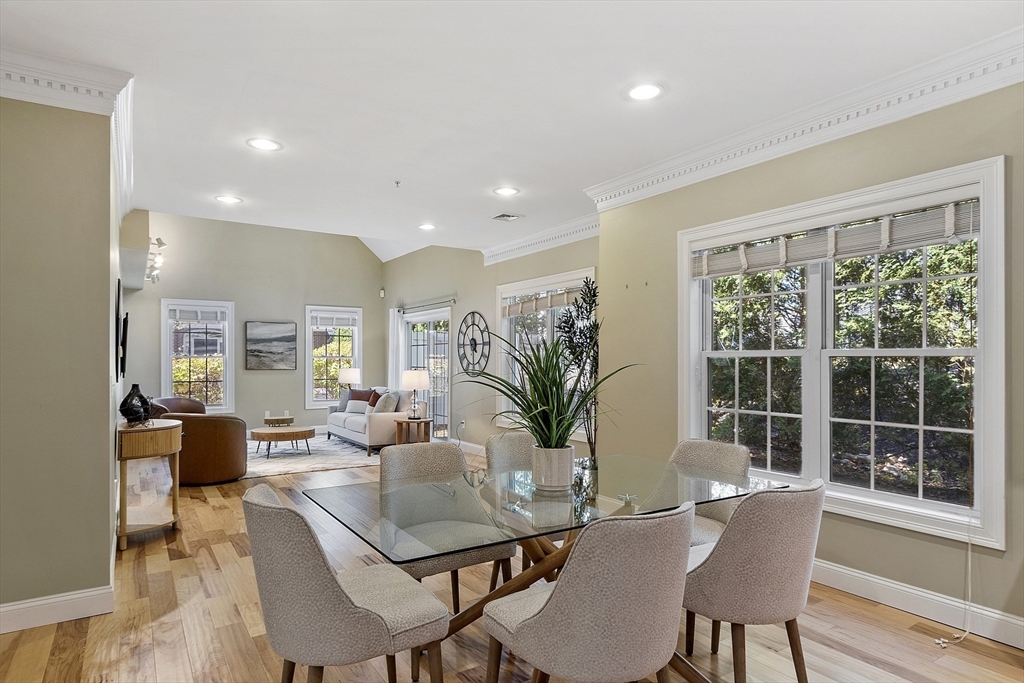 139 Prospect Street, Unit 5 Acton, MA 01720 - Photo 9 of 34 a dining room with furniture window and wooden floor