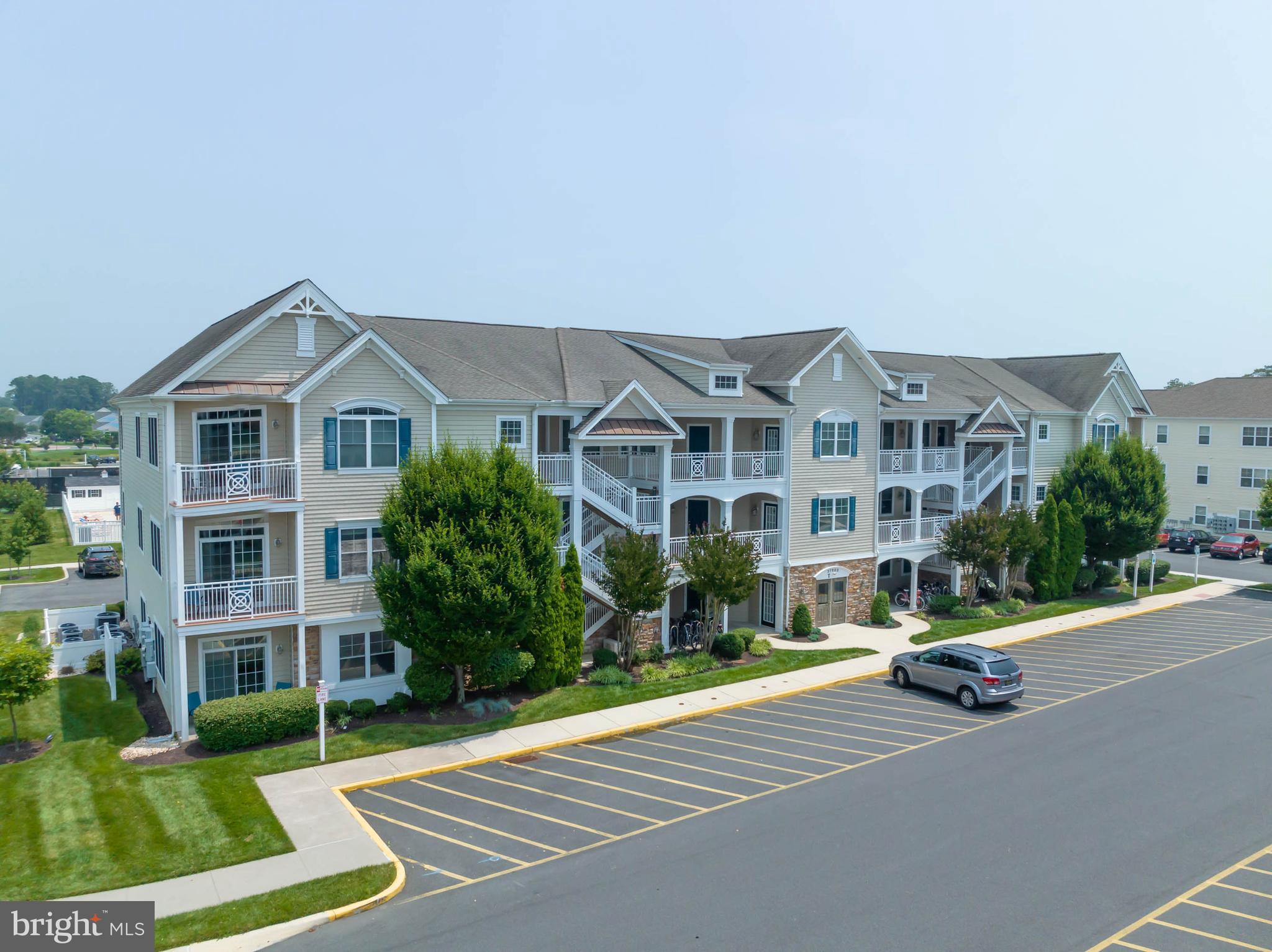 37685 Ulster Drive, Unit 11 Rehoboth Beach, DE 19971 - Photo 1 of 30 a view of a building with a street