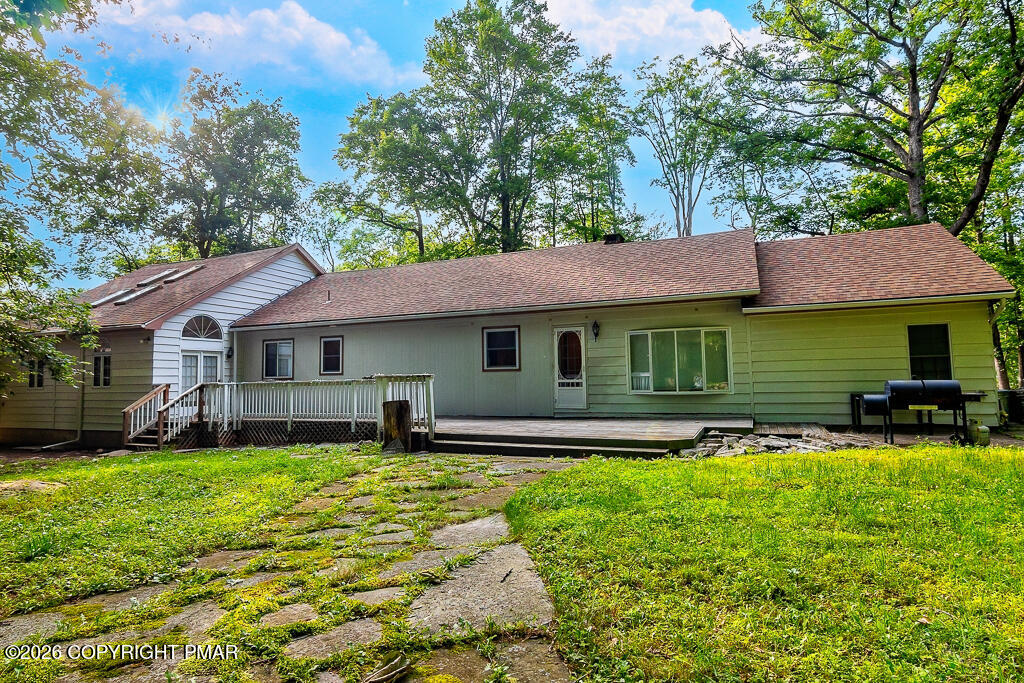 755 White Oak Road Cresco, PA 18326 - Photo 2 of 50 a front view of a house with a yard