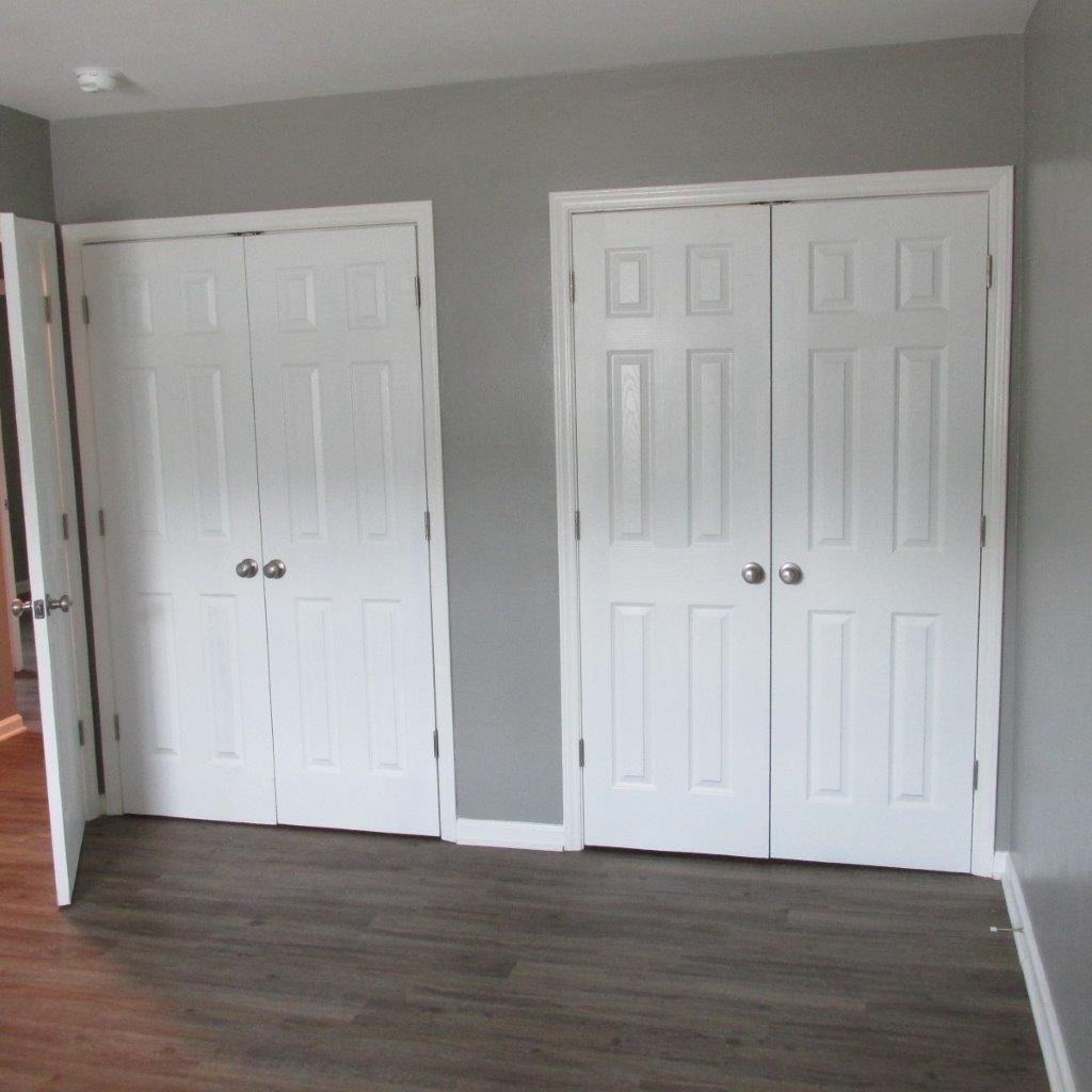 1525 Andrews Road Northwest Roanoke, VA 24017 - Photo 13 of 14 a view of an empty room with wooden floor