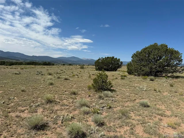 a view of ocean with a beach