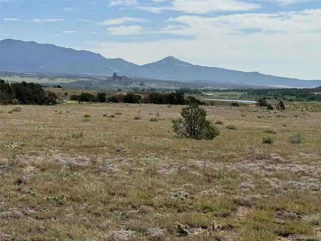 a view of a lake in middle of the town