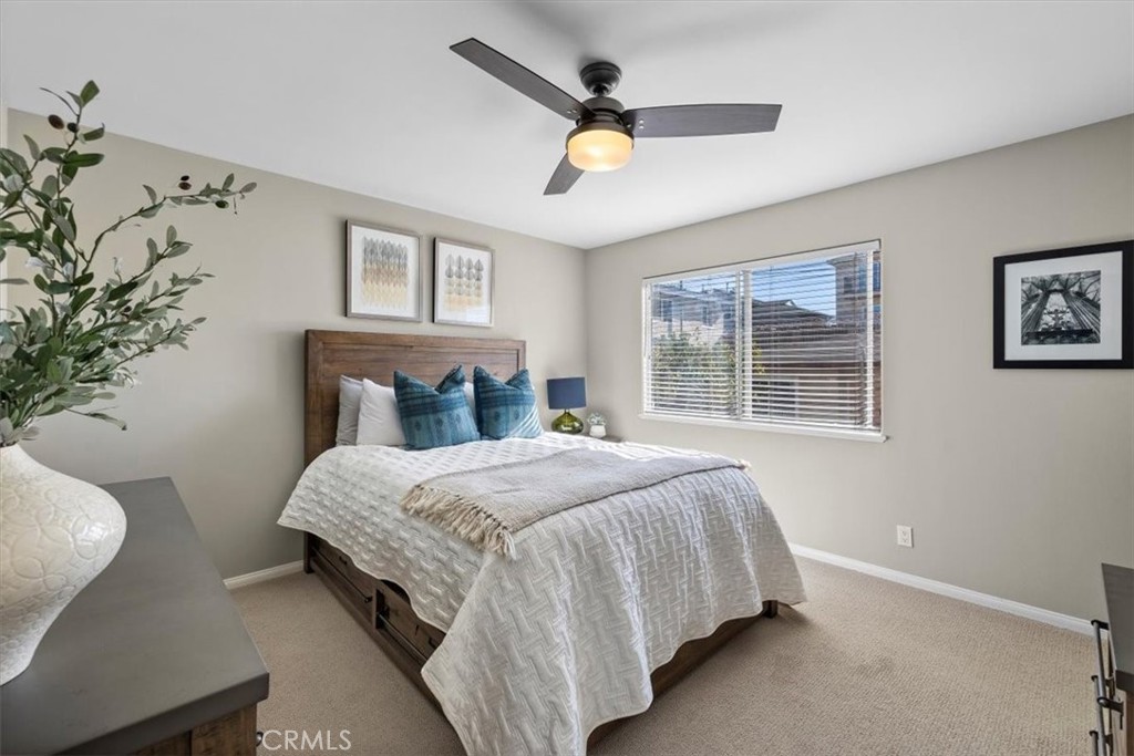 314 Penn Street, Unit 2 El Segundo, CA 90245 - Photo 12 of 23 a bedroom with a large bed and a chandelier