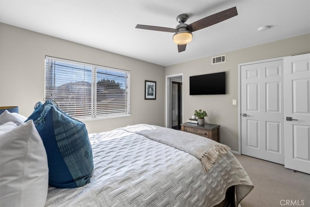 314 Penn Street, Unit 2 El Segundo, CA 90245 - Photo 13 of 23 a bedroom with a bed window and a flat screen tv