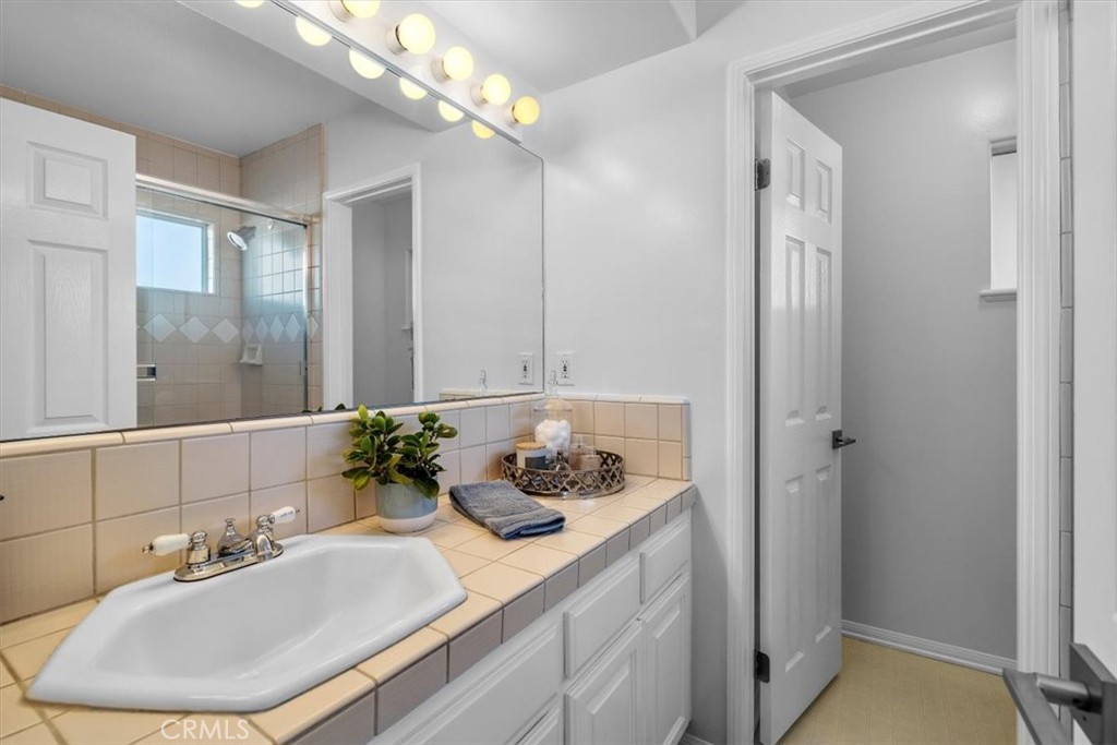 314 Penn Street, Unit 2 El Segundo, CA 90245 - Photo 16 of 23 a bathroom with a sink and a mirror