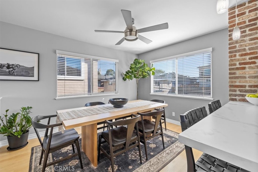 314 Penn Street, Unit 2 El Segundo, CA 90245 - Photo 7 of 23 a view of a dining room with furniture window and wooden floor
