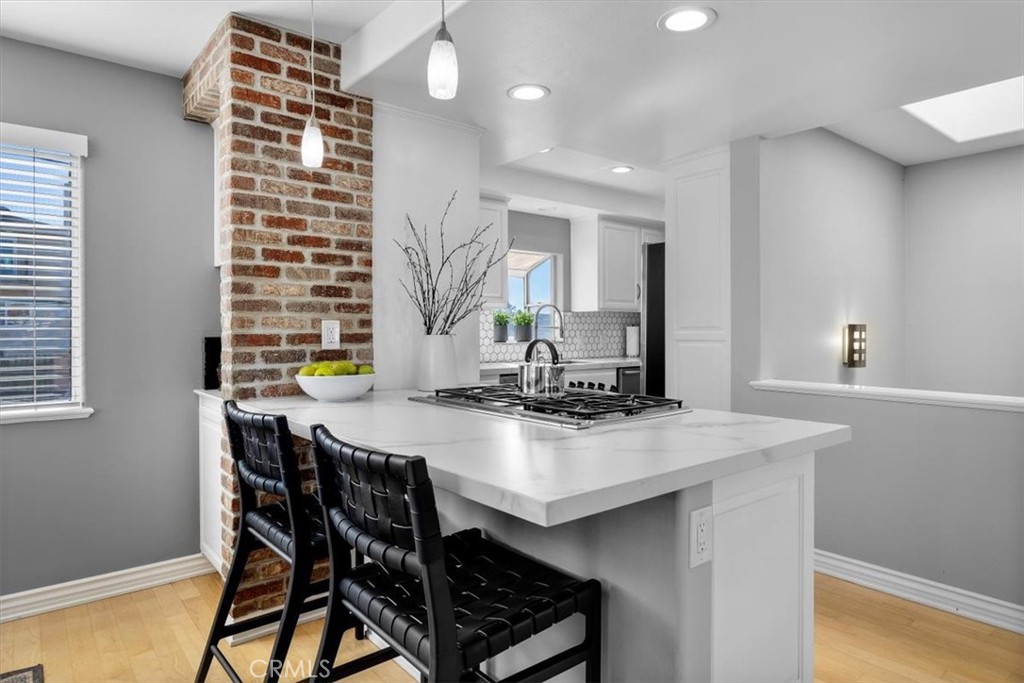 314 Penn Street, Unit 2 El Segundo, CA 90245 - Photo 8 of 23 a kitchen with a table and chairs in it