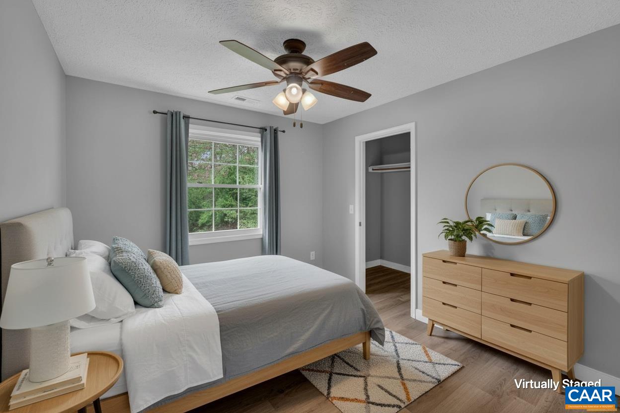 673 Cedar Lane Road Palmyra, VA 22963 - Photo 31 of 47 a bedroom with a bed and window