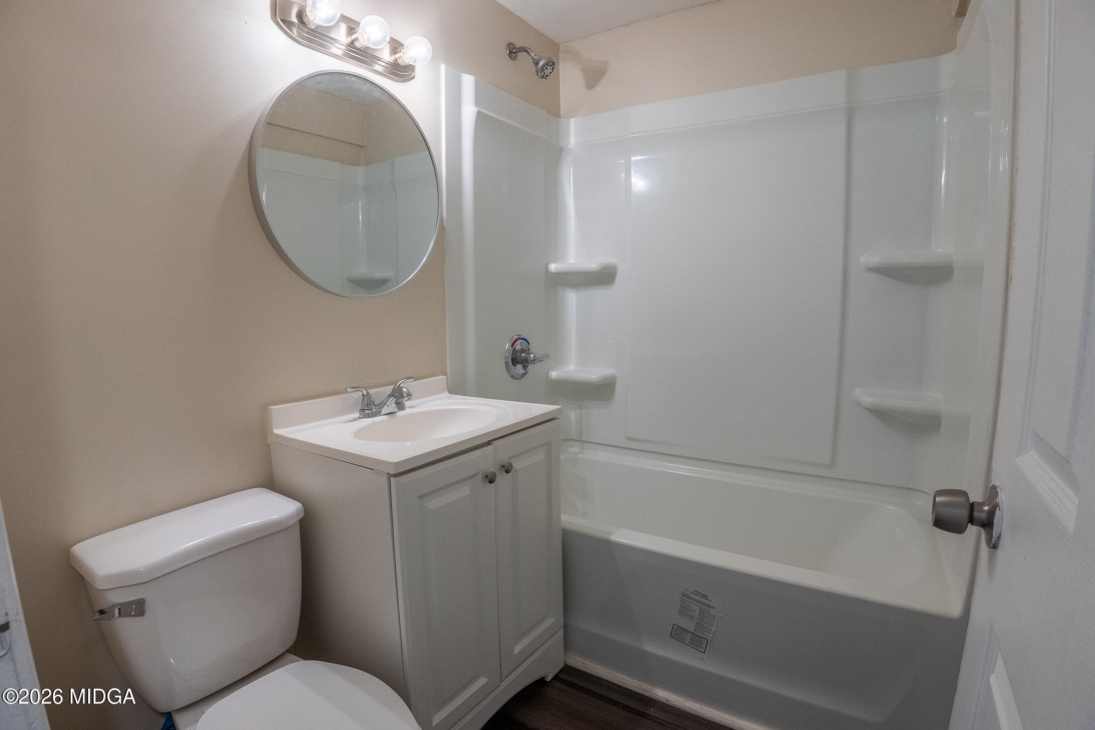 1957 Kitchens Road Macon, GA 31211 - Photo 11 of 18 a bathroom with a sink toilet and shower