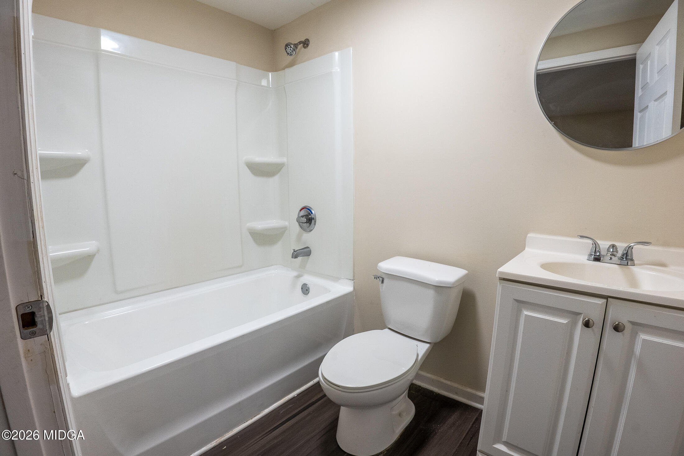 1957 Kitchens Road Macon, GA 31211 - Photo 14 of 18 a bathroom with a toilet a sink and bathtub