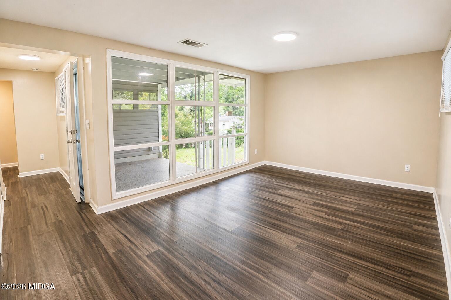 1957 Kitchens Road Macon, GA 31211 - Photo 6 of 18 a view of wooden floor and windows in a room