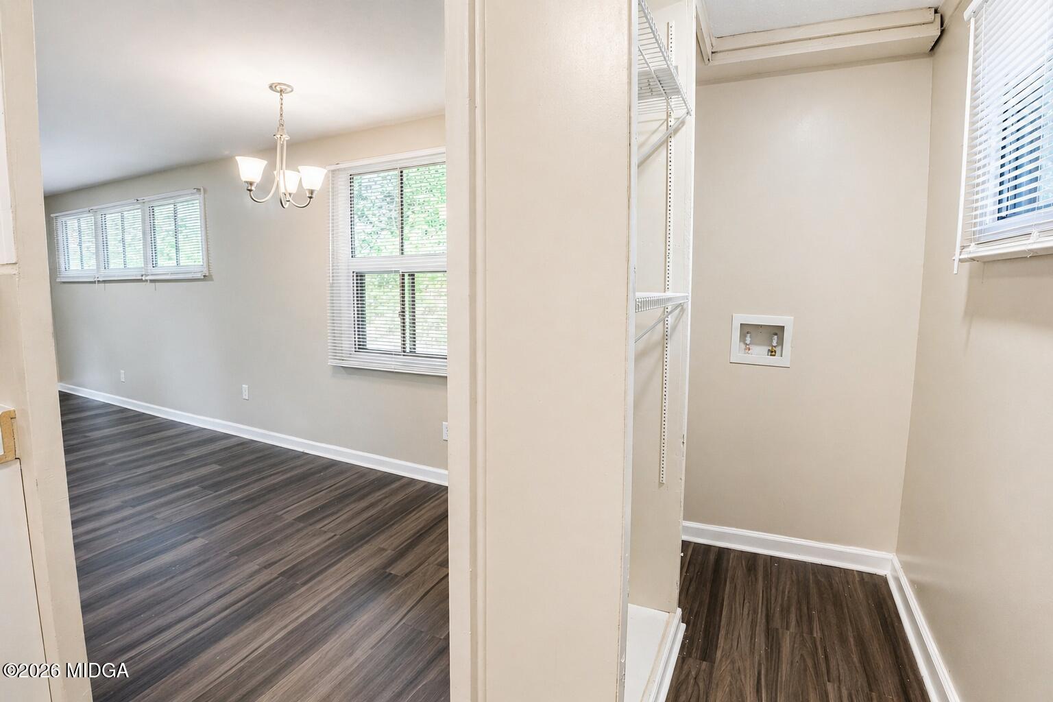 1957 Kitchens Road Macon, GA 31211 - Photo 8 of 18 wooden floor in an empty room with a window