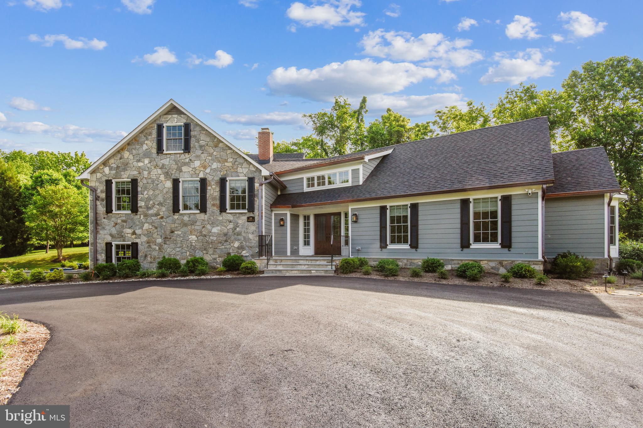 535 Springvale Road Great Falls, VA 22066 - Photo 2 of 80 All siding and stone work is new
