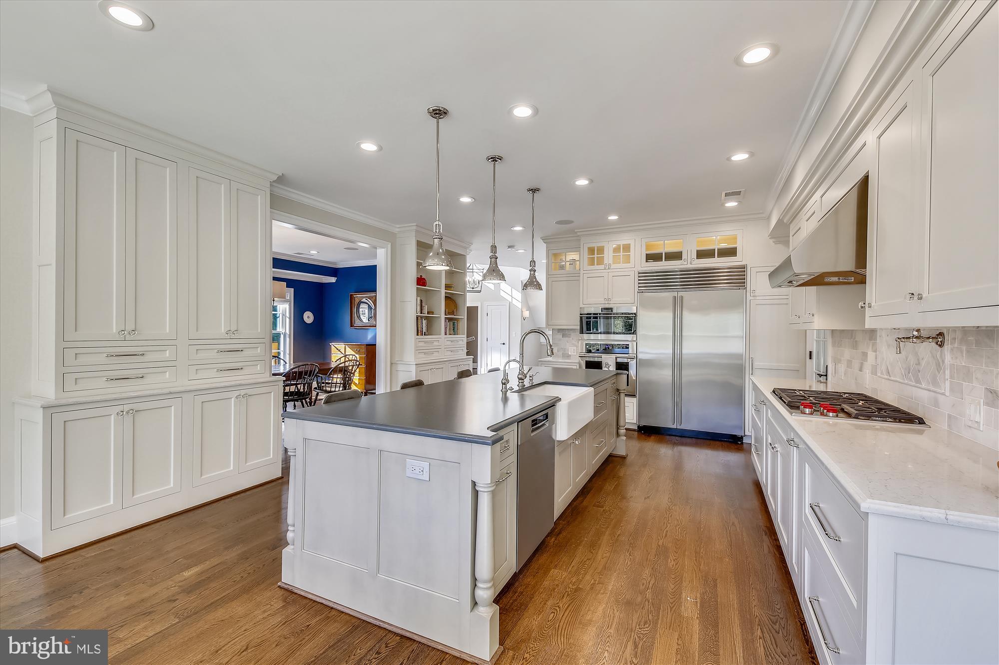 535 Springvale Road Great Falls, VA 22066 - Photo 14 of 80 More storage on the wall behind the island seating