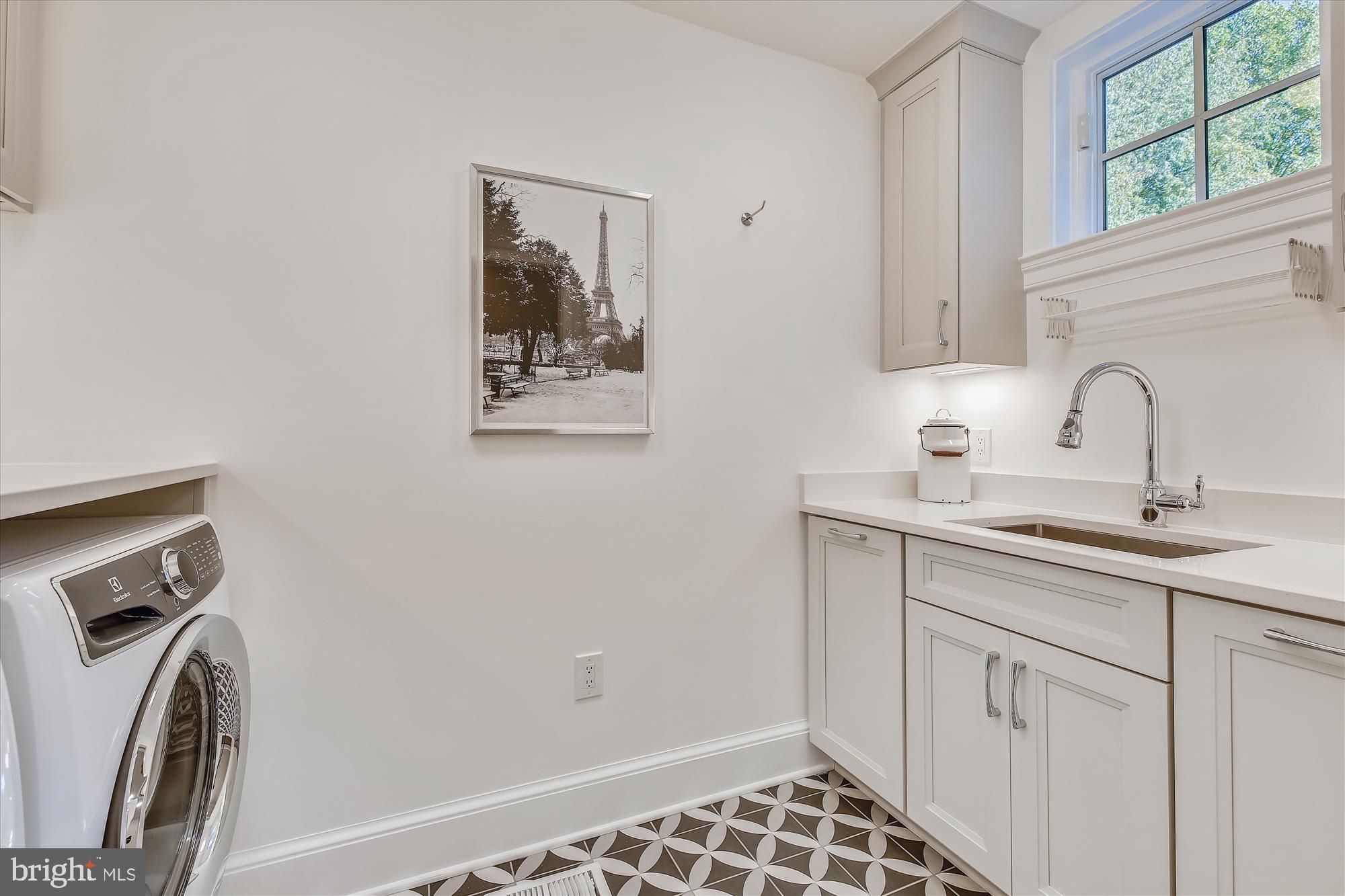 535 Springvale Road Great Falls, VA 22066 - Photo 50 of 80 Remodeled laundry room with concrete tile