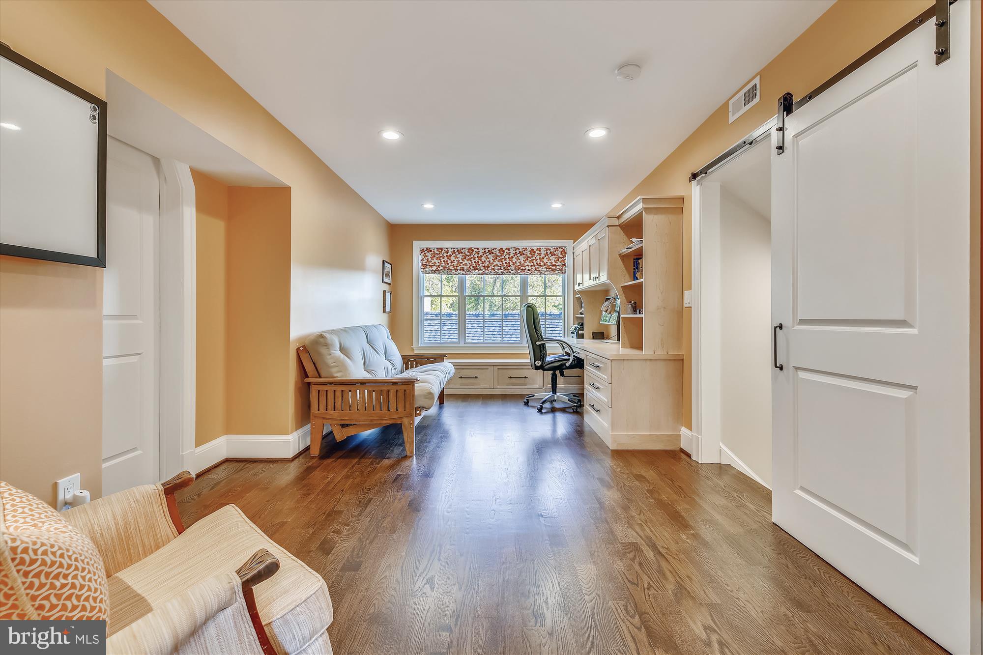 535 Springvale Road Great Falls, VA 22066 - Photo 54 of 80 Crawl space storage access behind barn door